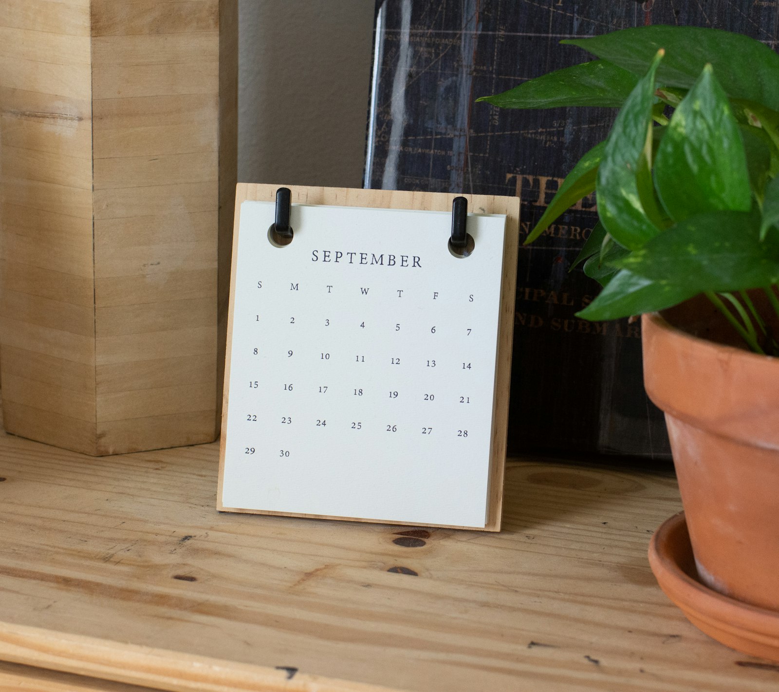 Monthly close calendar planning for a property management accounting team