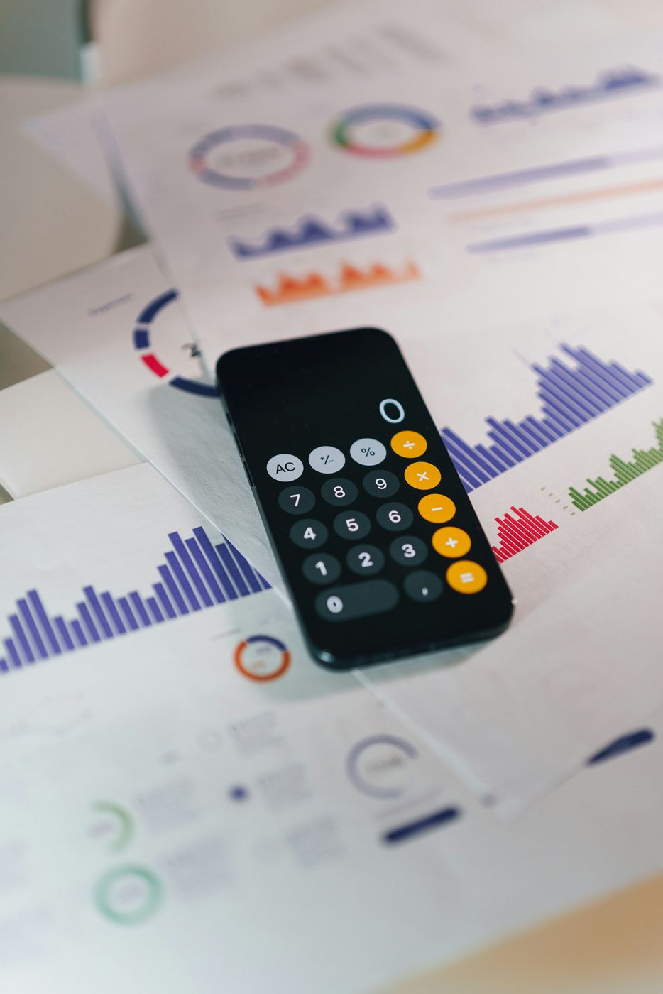Calculator on financial papers for an income statement for rental property