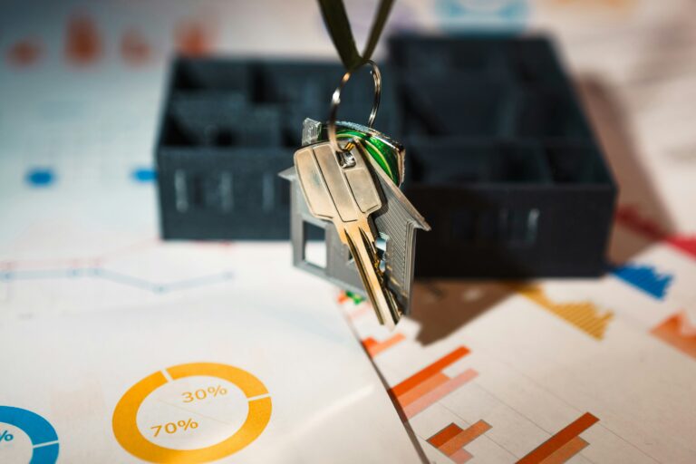 House-shaped keychain representing starting a property management company